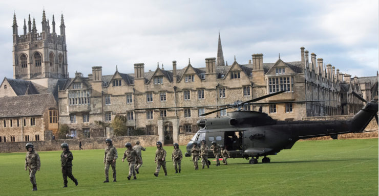 Magdalen College School pupils leaving a helicopter