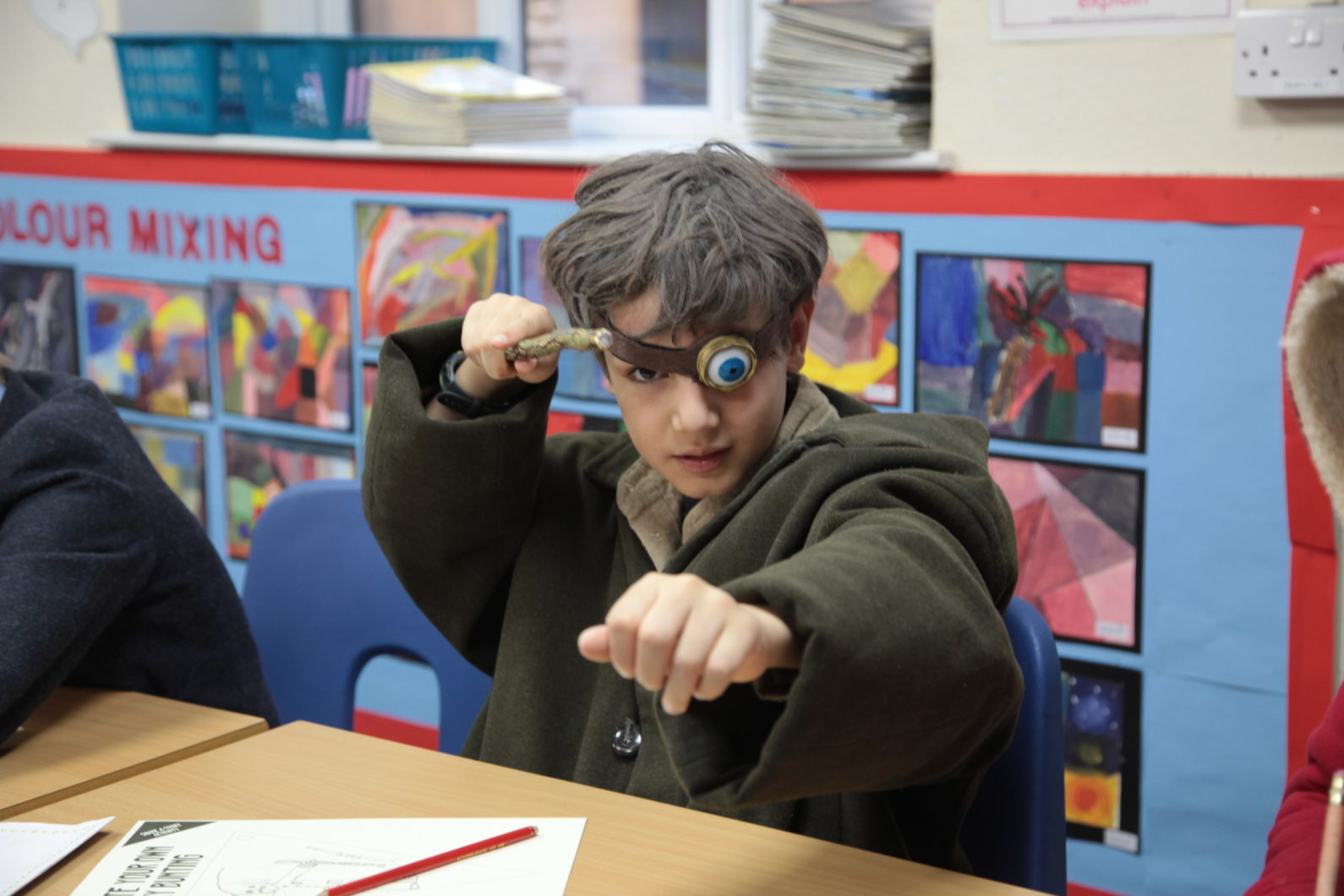 Magdalen College School pupil in Junior School Libary