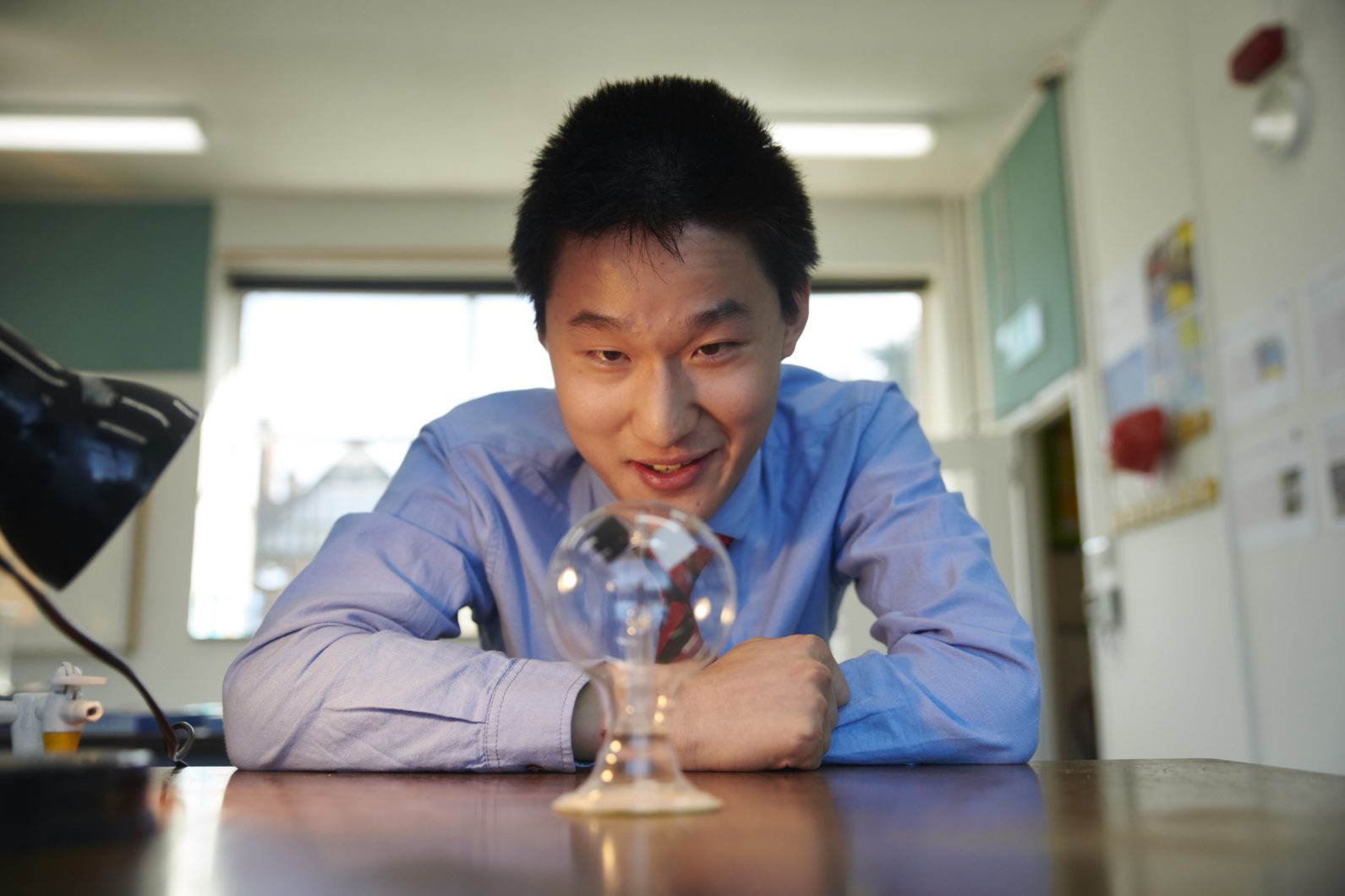 Magdalen College School pupil in Physics lab