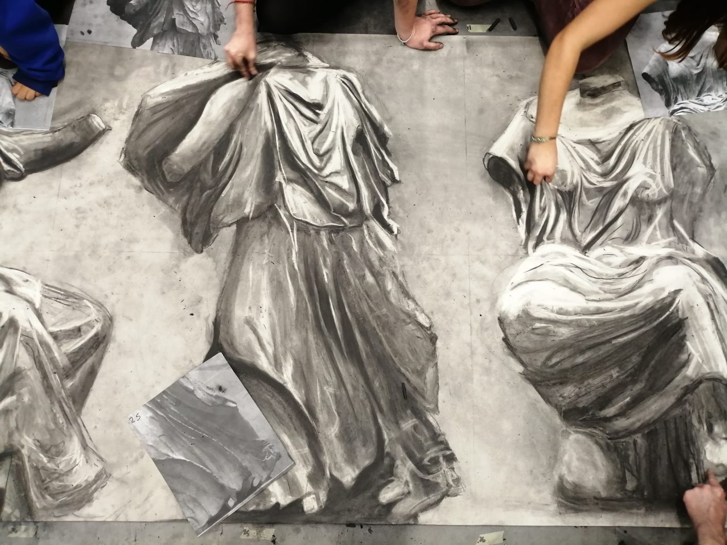 Sixth Form pupils at MCS working on charcoal and chalk drawing of the Elgin Marbles