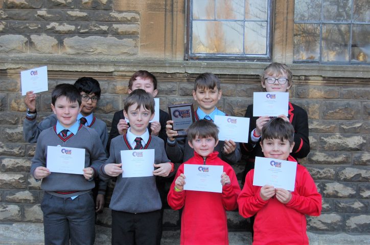 MCS Junior School Quiz Team stand with their certificates for the National General Knowledge Championships