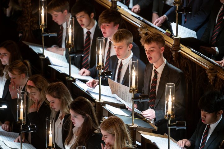 Magdalen College School choir in chapel at Christmas carol service 