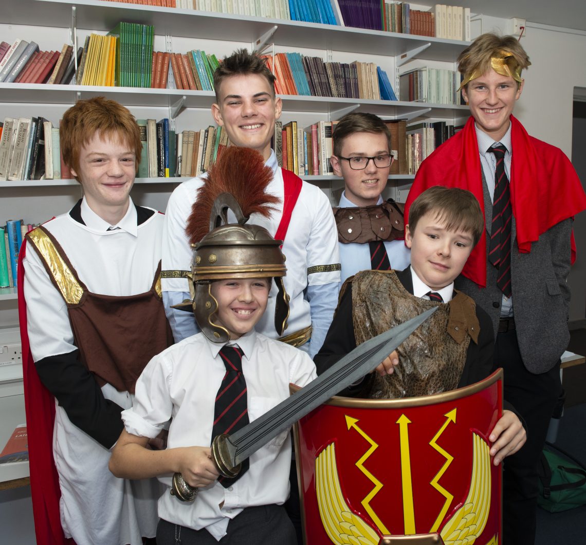 Magdalen College School pupils dressed as Roman soldiers and philosophers