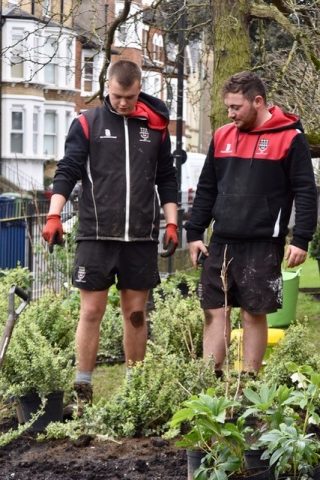 Magdalen College School Grounds Team working on garden next to Big School 