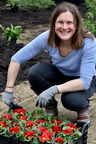 Sarah Harston, landscape gardener planting new design for Magdalen College School Oxford