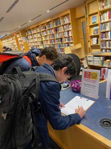 Pupils recommending books as part of the Giving Day 2026 book recommendation challenge